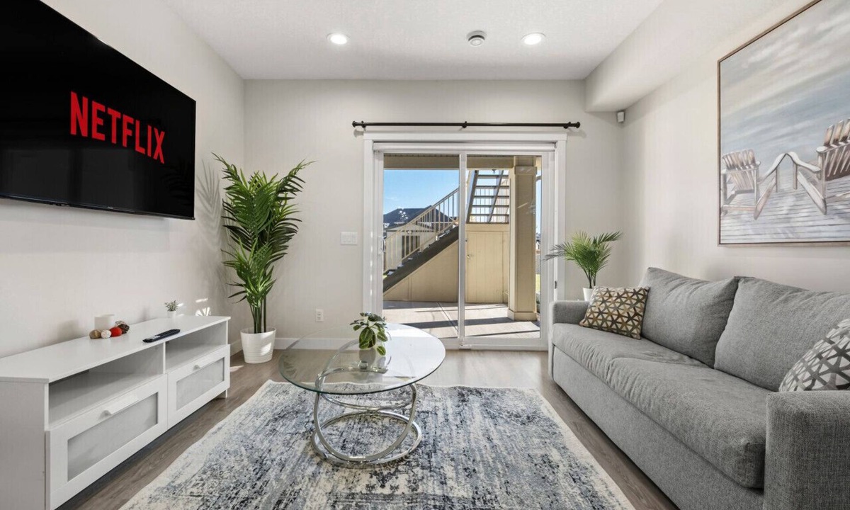 Sage Hill Apartment | 1BR Walk Out Suite » Backyard » Patio » 65” TV