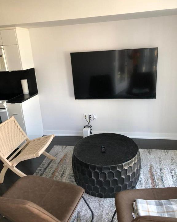 CityPlace Apartment | 2 Bedroom condo with CN tower views with parking and office space