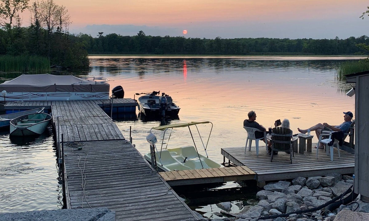Trent Lakes Cottage | Cheerful new 3 bedroom cottage on the water with beautiful sunset view