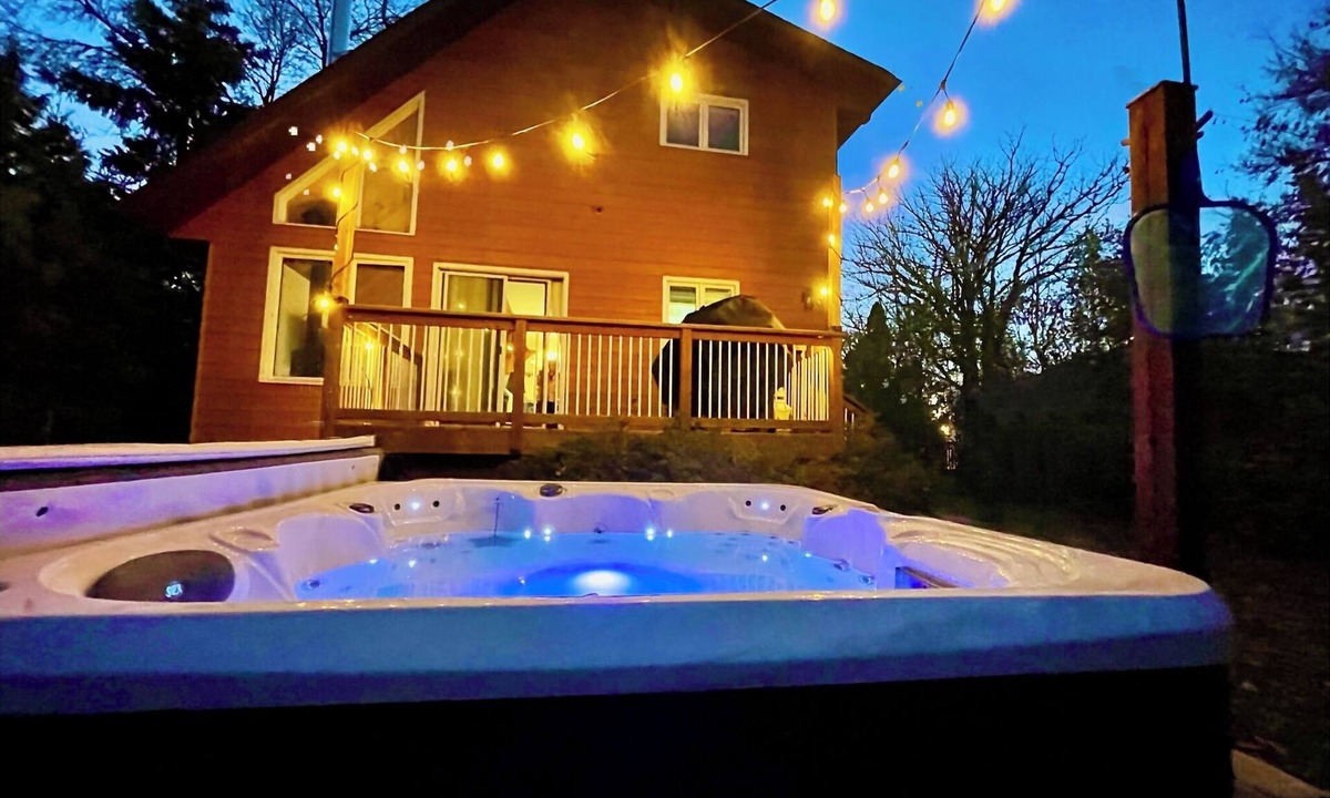 Sandy Hook Cabin | Cozy 4 season cottage with lake view and hot tub and access to private beach.