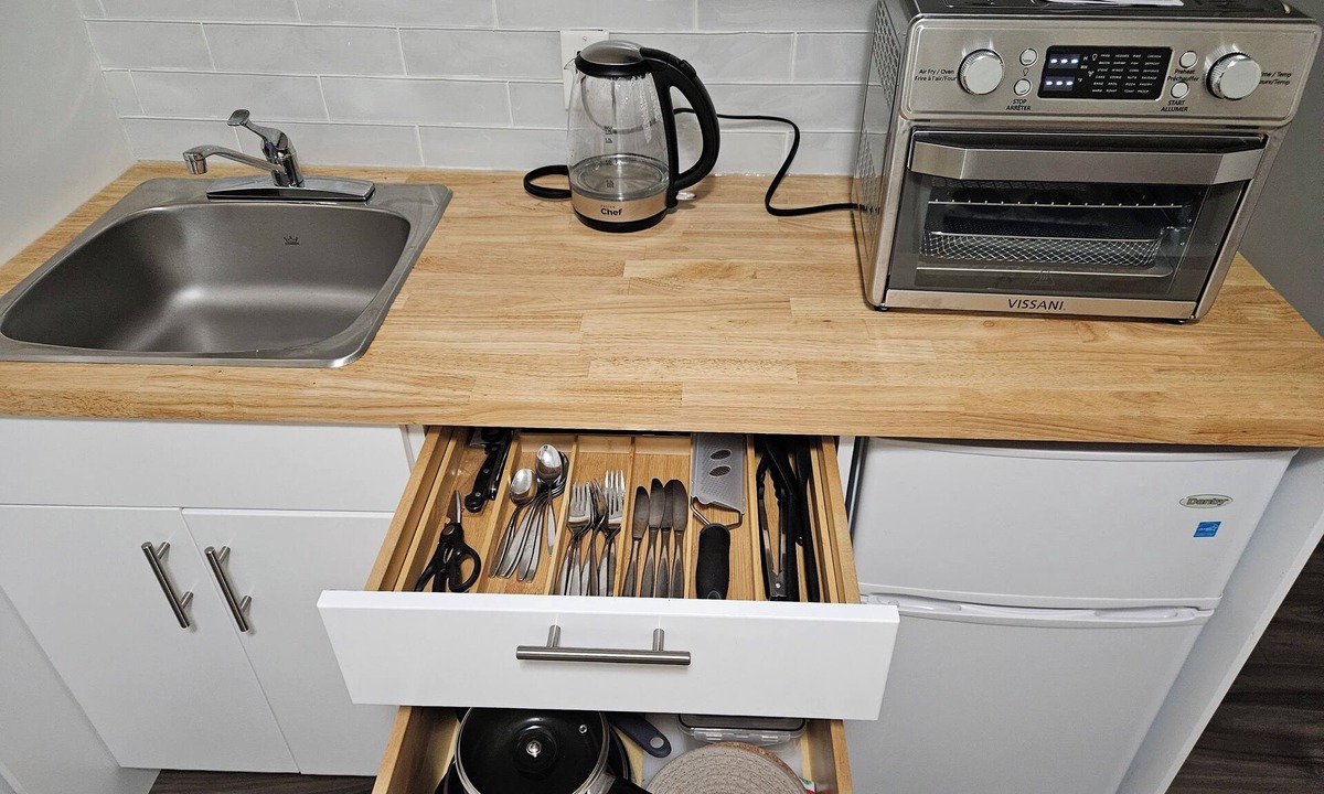 Langford House | Cozy and charming one-bedroom basement suite