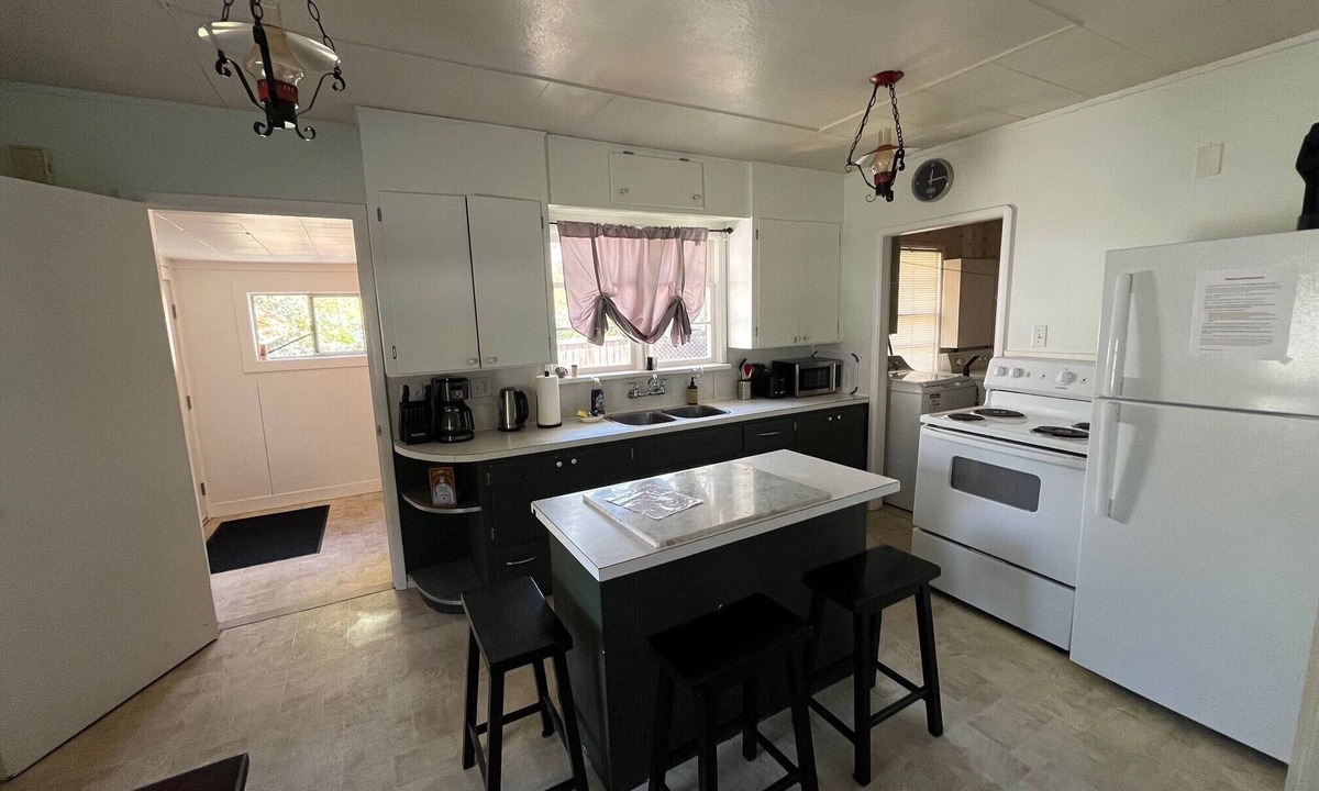 Duncan House | Cozy rustic 50's home located on a campground beside the Famous Cowichan River.