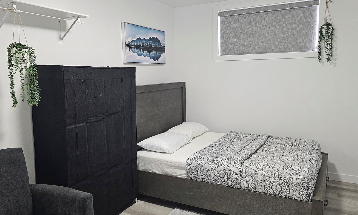 Saskatoon Apartment | "Discover Dominion's Crib! This chic and cozy space is ideal for travelers.