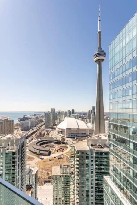 Toronto Entertainment District Apartment | Elegant Waterfront Downtown Toronto / Unobstructed CN Tower View