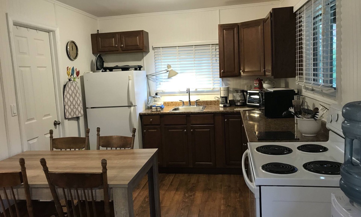 Milford Cottage | Nature Lover's Cottage Retreat On The Black River With Private Dock.