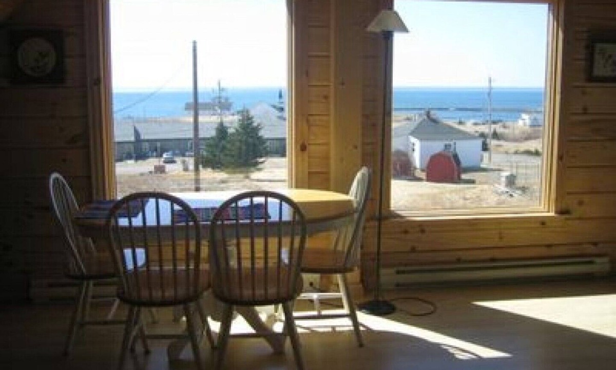 L'Ardoise West House | New Log Home with Gorgeous Ocean View in Historic Acadian Village