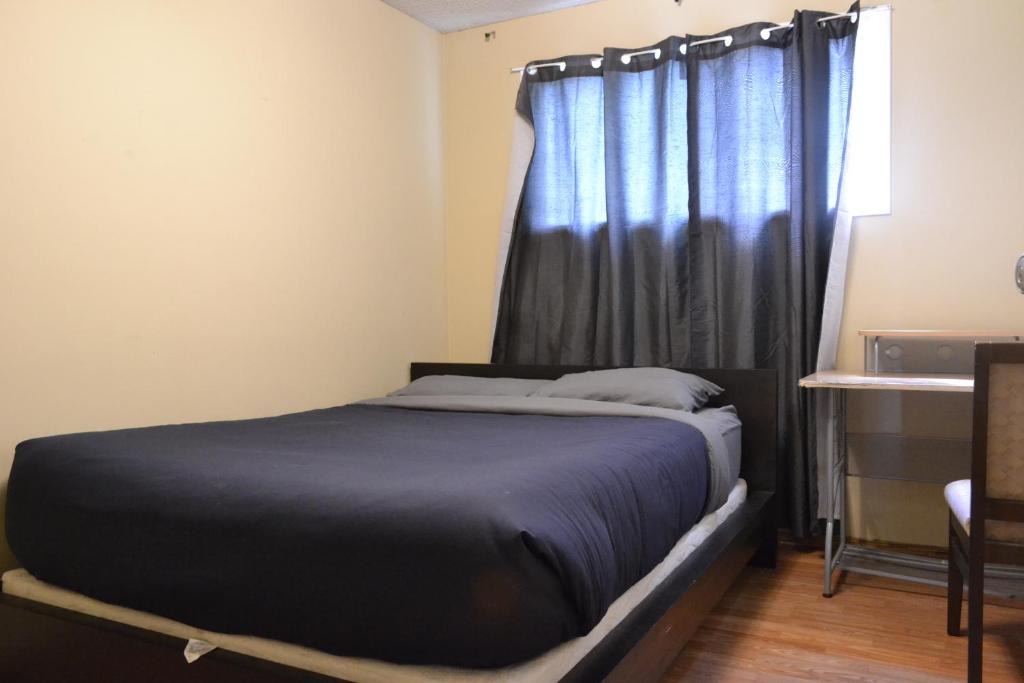 Forest Lawn Apartment | Private Bedroom #3 on main floor