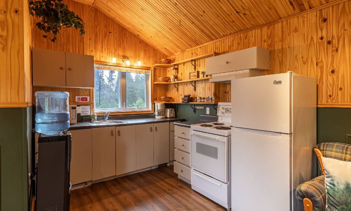 Lac-Etchemin Ski Chalet | Riverside chalet with fire pit, indoor fireplace, perfect for nature retreats.