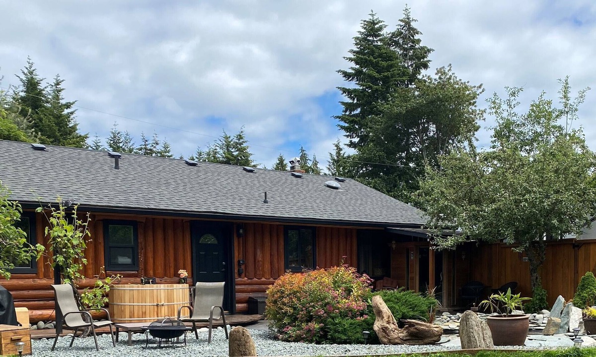 Sooke Cabin | True West Coast experience custom log home with sauna & outside cedar soaker tub