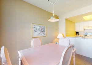 4th-floor condo with heated pool, hot tub, gym, balcony, fireplace, W/D, sauna