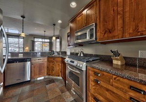 Exceptional multi level 3 bedroom + den townhouse, close to Morrisey lift