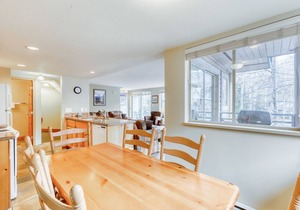 Ideal first-floor getaway with hot tub, fireplace, & balcony - walk to lifts