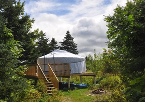 Large sky blue yurt at Cabot Shores Wilderness Resort
