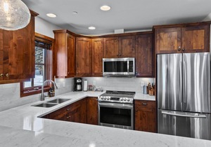 Magnificent multi level 3 bedroom + den townhouse, close to Morrisey lift