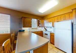 Ski-in/out condo with private hot tub, majestic mountain views, & fireplace