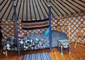 Small blue yurt at Cabot Shores Wilderness Resort