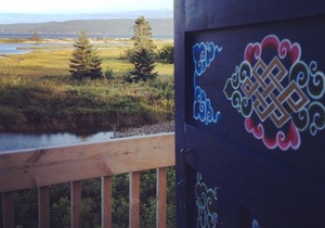 Small blue yurt at Cabot Shores Wilderness Resort