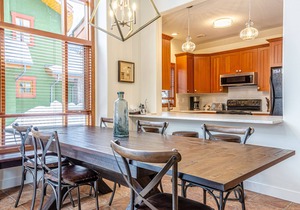Spacious multi level 4 bedroom + den townhouse with easy access to nearby runs and lift