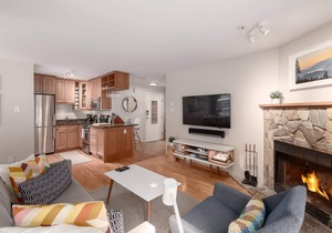 Updated, bright & cozy corner unit with private bike/ski storage and free parking