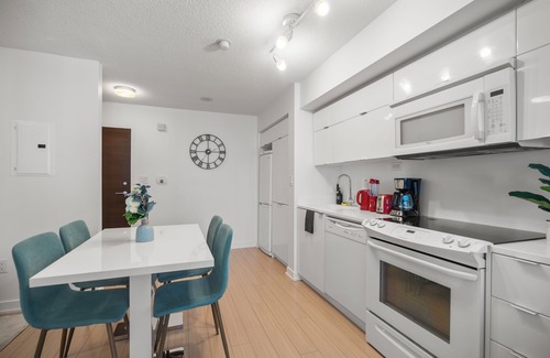 CityPlace Condo | 2BD 1 Bath 4 Guests Parking Balcony Near CN Tower Downtown—By Hostia