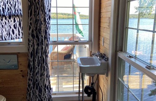 Darlings Lake Cottage | Awesome Lakefront. Step off the lower deck into the water.