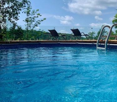 Morin Heights Ski Chalet | Blue Hill Pool spa game room mountain view