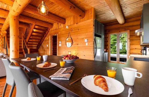 Petite-Riviere-Saint-Francois Ski Chalet | Chalet Bois Rond 10: River Views, Terrace & Spa