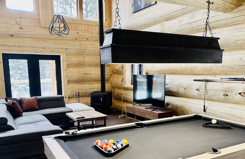 Sainte-Marguerite-du-Lac-Masson Ski Chalet | Fief on the river, luxury and relaxation. Access to the river and private spa