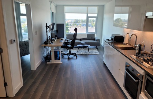Sunset Condo | Contemporary & Pet-Friendly 1BR + Den Condo featuring a Charming Patio