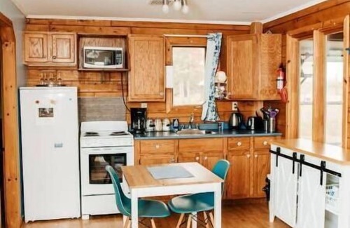 Tatamagouche Cottage | Escape to Tranquility at The Sandy Pearl: A Cozy Log Cottage Retreat