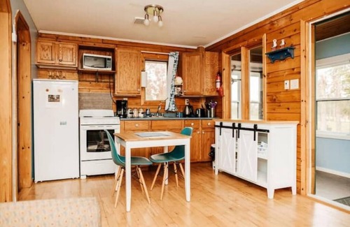 Tatamagouche Cottage | Escape to Tranquility at The Sandy Pearl: A Cozy Log Cottage Retreat