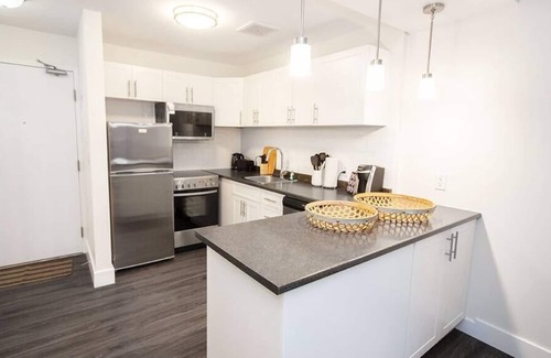 Downtown Winnipeg Apartment | Free Parking, Private Patio, Laundry and Wi-Fi!