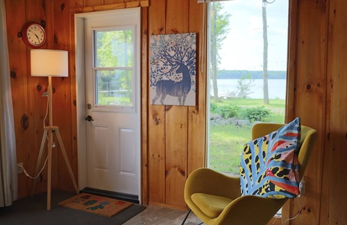 East Dalhousie Cottage | Lake front cottage with beach & dock (Pet-Friendly!)