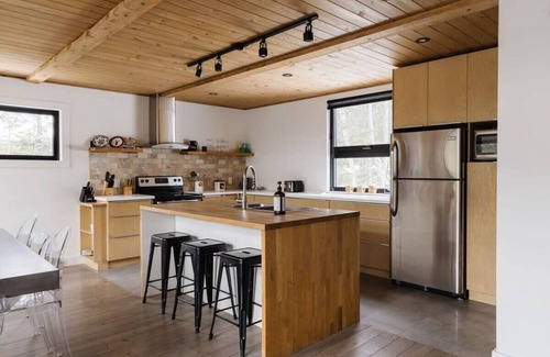 Chertsey Ski Chalet | Lakefront Nature Haven with Serene Spa