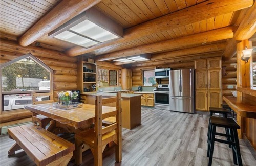 Magna bay Ski Chalet | Lakeview log cabin for large groups, 4 season fun! Beach access, buoy, hot tub