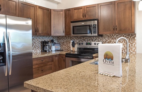 South Pandosy Condo | Playa Del Sol Two Bedroom With Den on 5th Floor