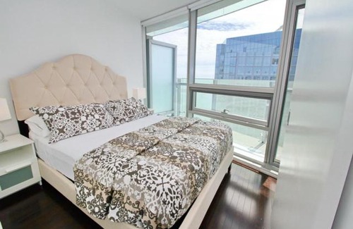 Toronto Entertainment District Apartment | Presidential 2Br plus 1 Condo, Entertainment District - Downtown with CN Tower View, Balcony, Pool & Hot Tub