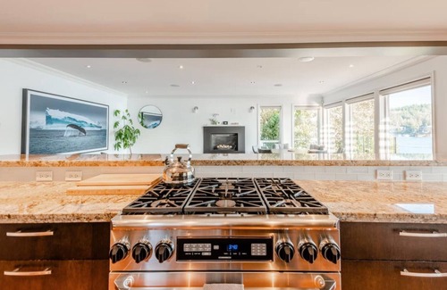 District of North Vancouver House | Stunning Waterfront Deep Cove Home w/Private Dock