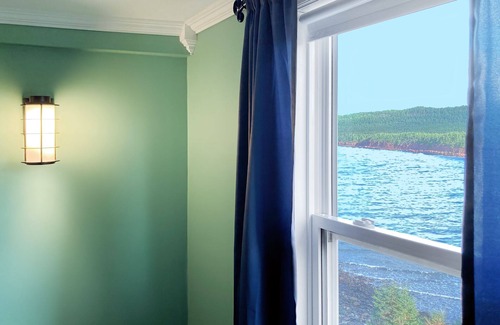 Norman's Cove-Long Cove House | Upstairs @ The Homestead Oceanfront Suites