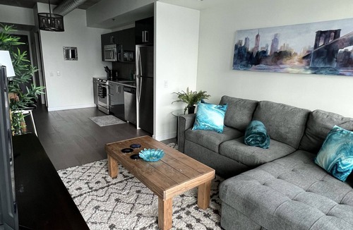 Downtown Winnipeg Apartment | 2 bed downtown sleeps 5 across jets arena king bed