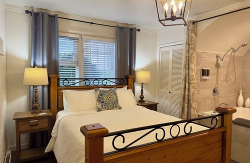 Harrison Hot Springs Hotel | 2 person jacuzzi suite with fireplace and kitchenette