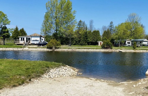Stokes Bay House | #21 Rivers Edge; sunset waterfront view