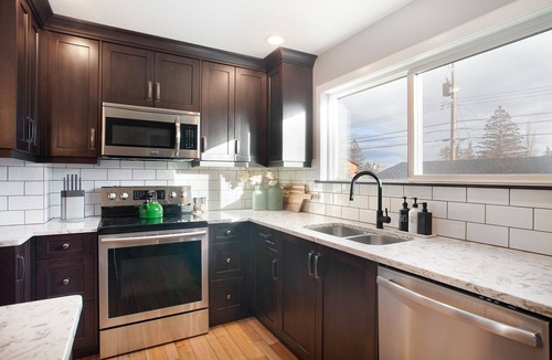 Southwest Calgary House | 4-bedroom detached home with recreation room and hot tub!