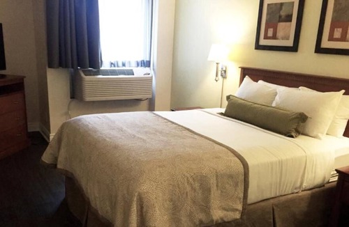 Quartier des Spectacles House | 4 x One Queen Room with Balcony at Hotel Saint-Laurent Montreal