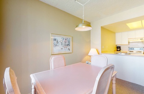 Upper Village Condo | 4th-floor condo with heated pool, hot tub, gym, balcony, fireplace, W/D, sauna