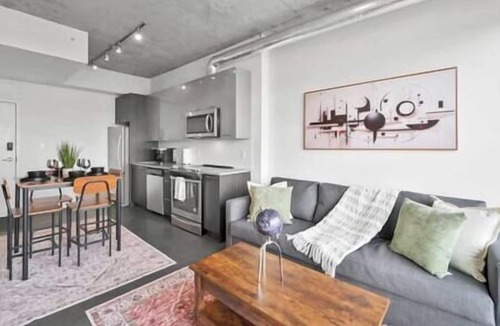East Village Apartment | 5 min Walk to Stampede | King Bed | Sofa Bed | AC