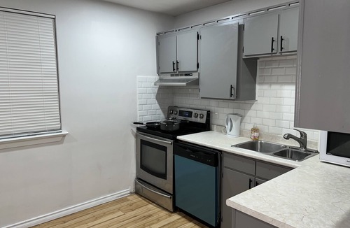 West Hill House | A cozy fully furnished apartment. Sleeps six. Close to all amenities.