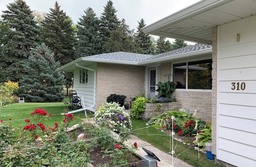 Killarney House | Bayside home with birds, butterflies, deer, and gardens