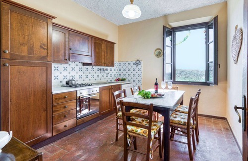 Castellina in Chianti Apartment | Beautiful apartment for 6 people with WIFI, A/C, pool, TV, patio, pets allowed and panoramic view
