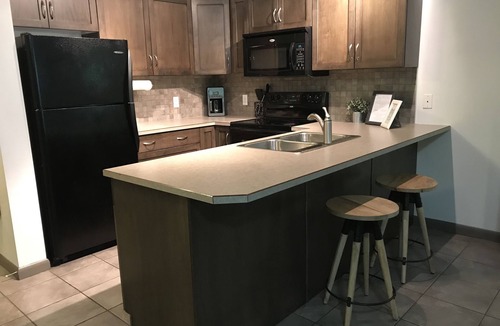 South Pandosy Condo | Beautiful 2nd Floor Condo on Quiet Creekside